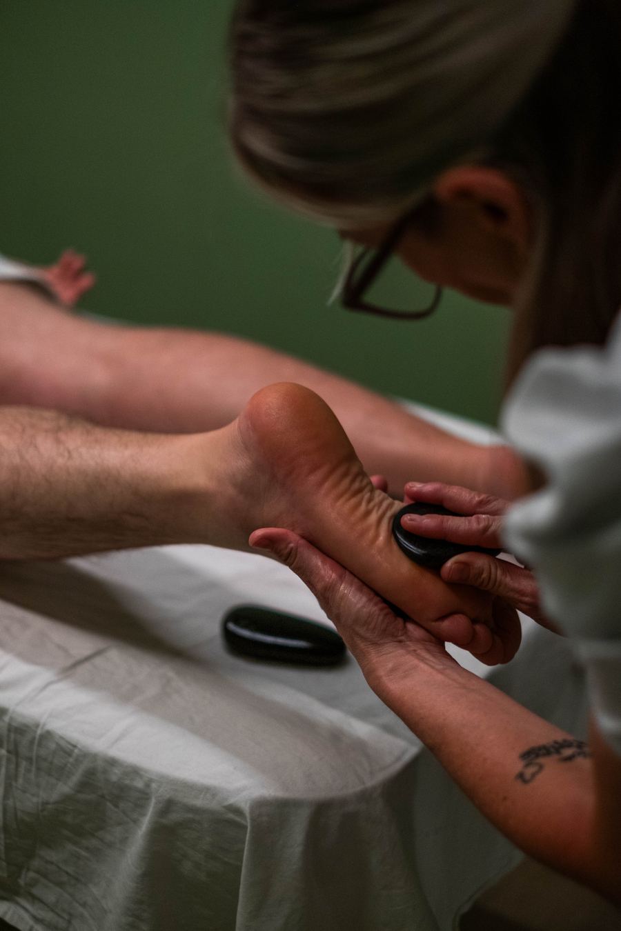 Reflexologia podal em atendimento